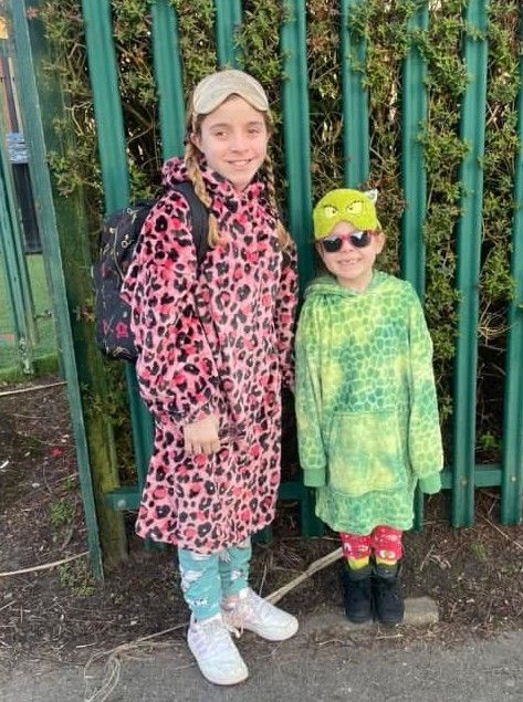 Two small children in WBD costumes