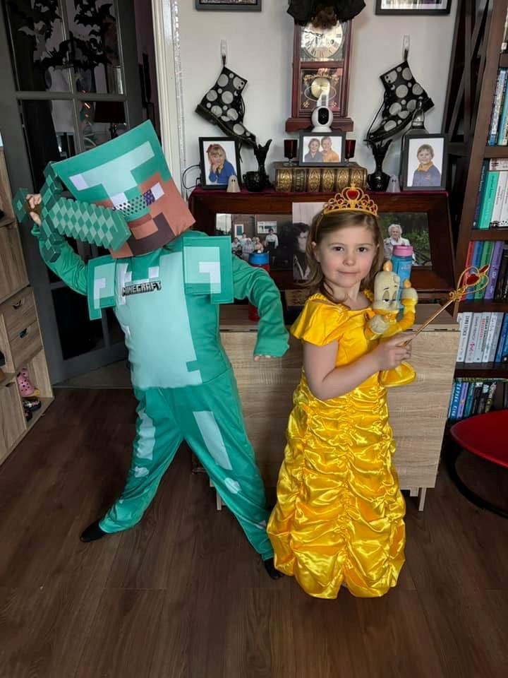 A boy and a girl in fancy dress