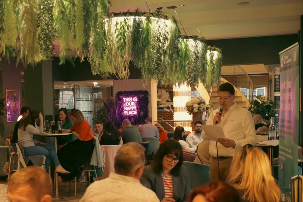 The host asks questions at a charity quiz at the Post House in Stafford